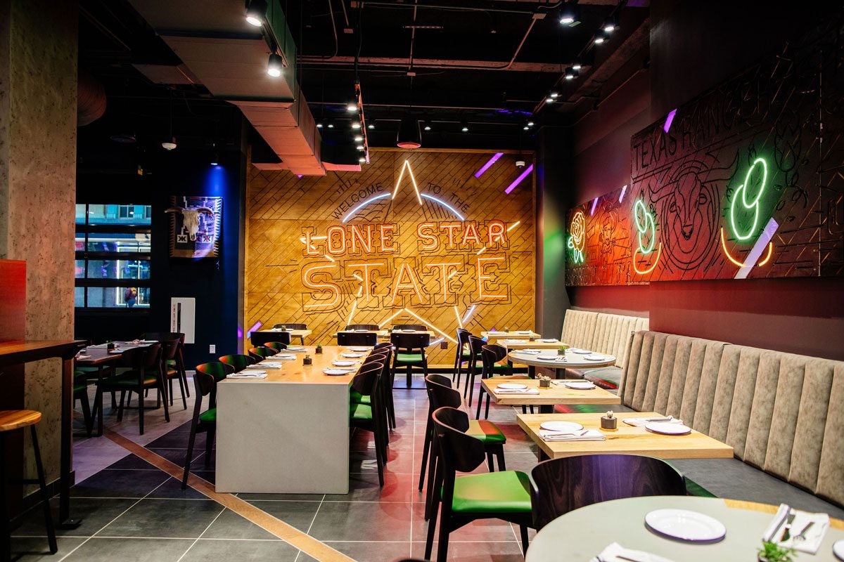 Jaxon dining room with Lone Star State neon sign